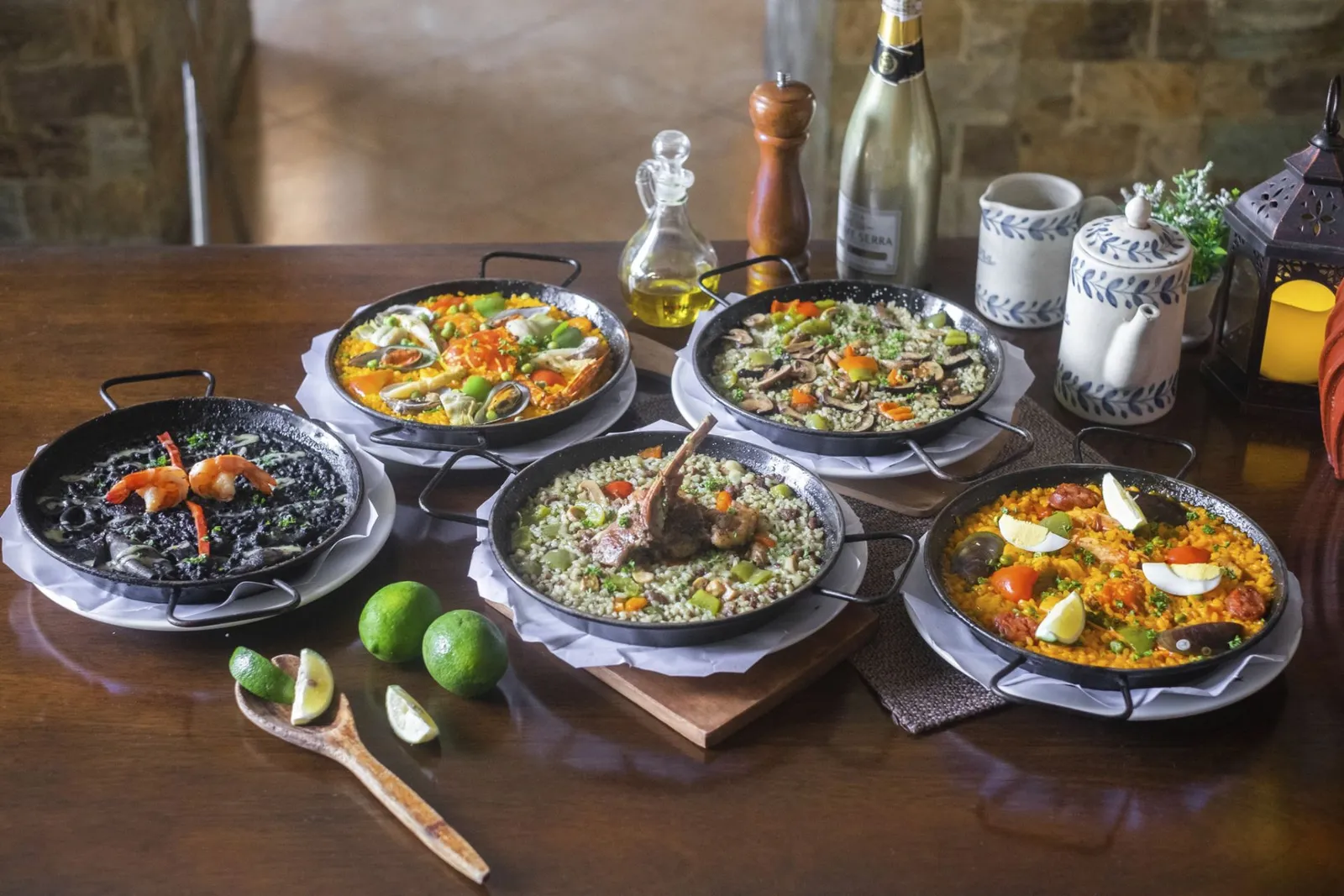 Several paella pans served at Alba Restaurante Español
