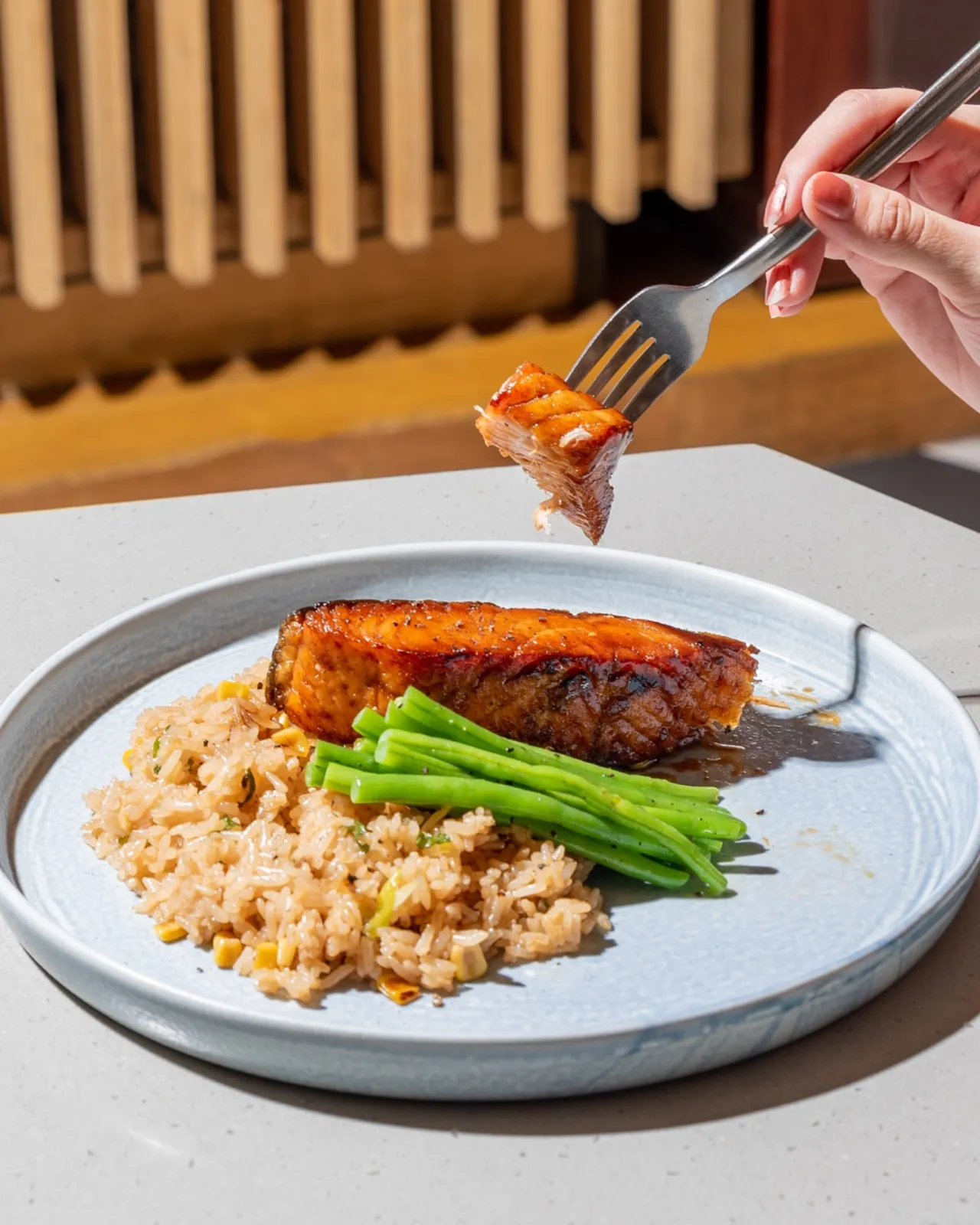 Glazed salmon fillet with rice and green beans