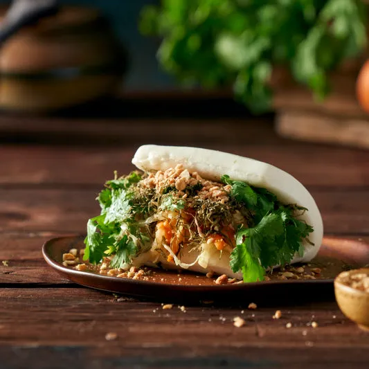 Chinese lumpia bao with herbs and crushed peanuts